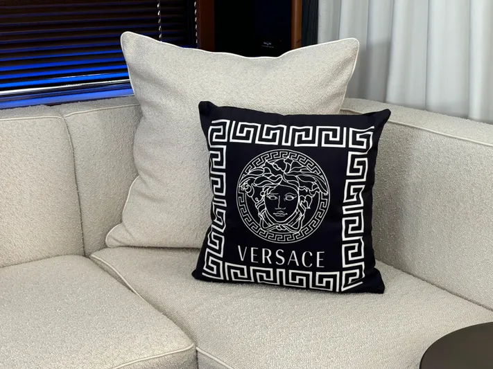  Yacht Photos Pics Versace cushion on a beige sofa inside a 2010 Princess 62 Flybridge yacht.