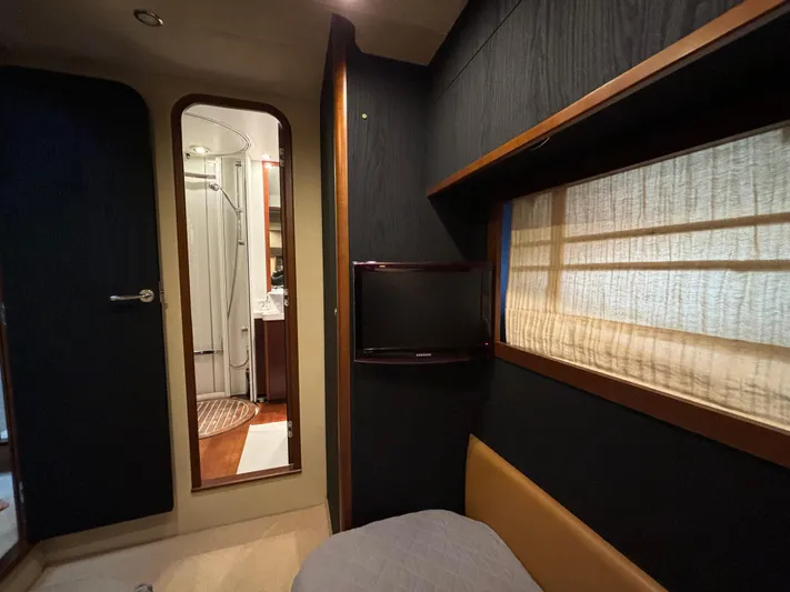  Yacht Photos Pics Interior of 2010 Princess 62 Flybridge yacht with cozy cabin and bathroom view.