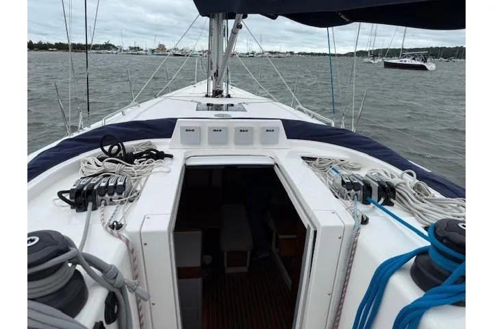  Yacht Photos Pics 2016 X-Yachts XP-44 sailboat deck view with rigging and open cabin entrance.