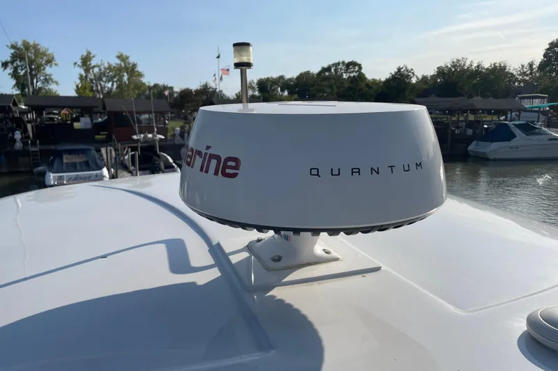  Yacht Photos Pics Radar system on 2019 Rinker 370 EX boat docked at marina.