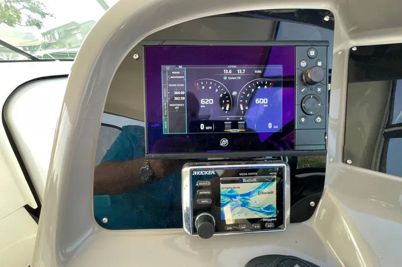  Yacht Photos Pics 2019 Rinker 370 EX dashboard with digital display and control panel.