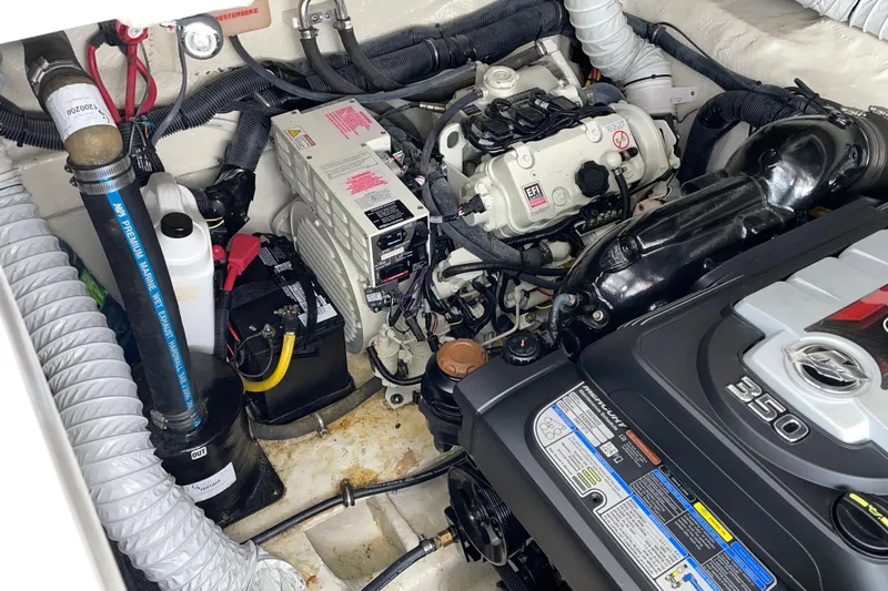  Yacht Photos Pics Engine compartment of a 2019 Rinker 370 EX boat, featuring a Mercury 350 engine.