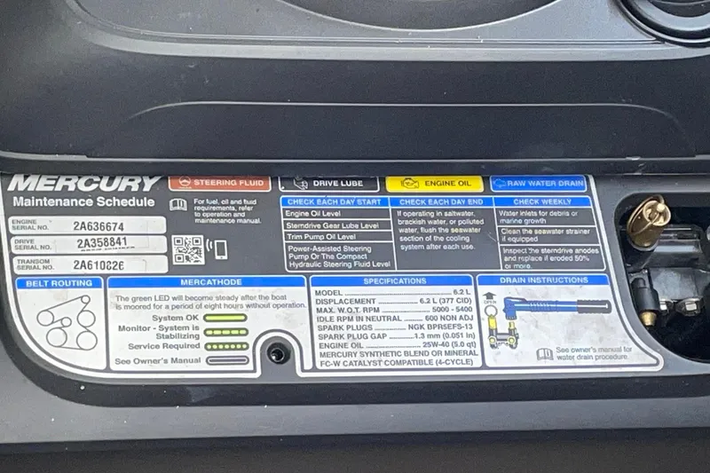  Yacht Photos Pics Mercury maintenance schedule label on a 2019 Rinker 370 EX boat engine.