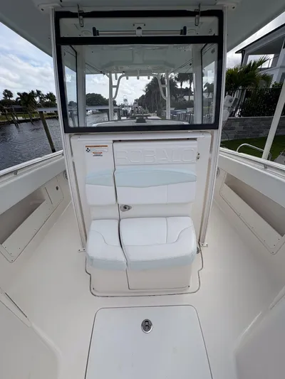  Yacht Photos Pics 2018 Robalo R302 Center Console boat interior with seating and console view.