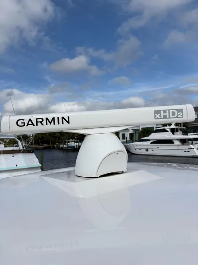  Yacht Photos Pics Garmin xHD2 radar on 2018 Robalo R302 Center Console boat, docked with yachts in background.