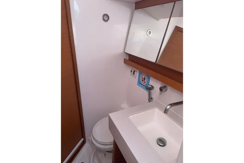  Yacht Photos Pics 2022 Dufour 530 yacht bathroom with modern sink and toilet.