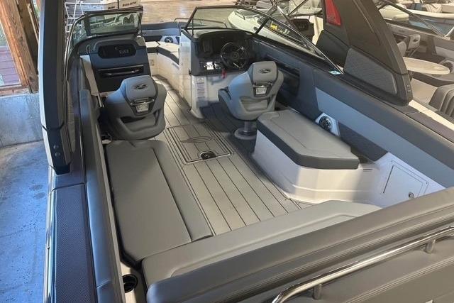 2025 Chaparral 2870 SSX boat interior with sleek seating and modern dashboard.