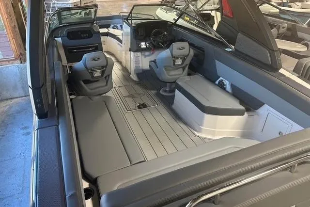 2025 Chaparral 2870 SSX boat interior with sleek seating and modern dashboard.