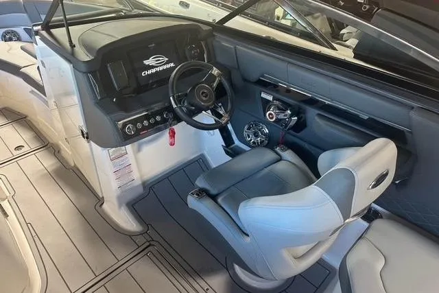 2025 Chaparral 2870 SSX boat interior with modern helm and seating.