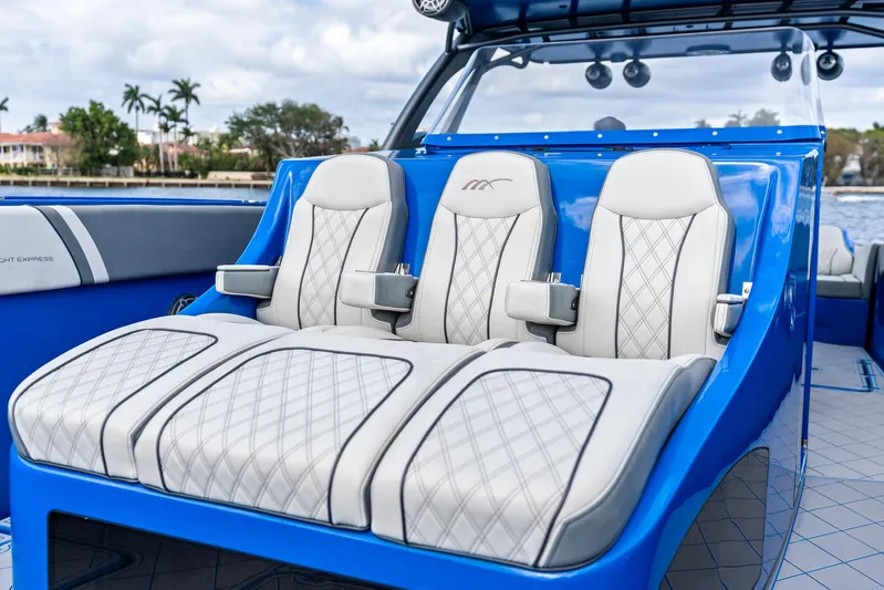 Yacht Photos Pics Luxurious seating on a 2020 Midnight Express Open boat, featuring elegant white upholstery.