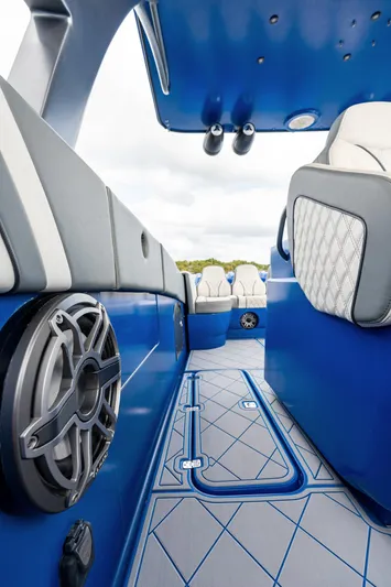  Yacht Photos Pics 2020 Midnight Express Open boat interior with blue and gray seating, speaker, and modern design.
