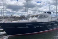 2007 Elling E3 yacht docked under cloudy skies.