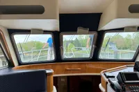 Interior view of 2007 Elling E3 yacht with modern dashboard and panoramic windows.