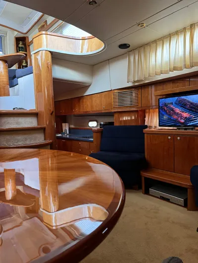 Celaeno Yacht Photos Pics Luxurious interior of a 2007 Elling E3 yacht with polished wood and modern amenities.