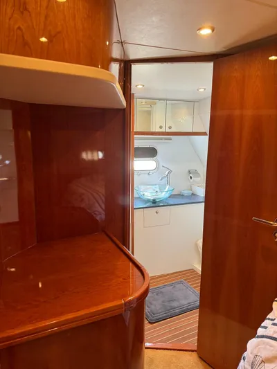 Celaeno Yacht Photos Pics Elling E3 2007 yacht interior with wooden finish and modern bathroom.