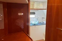 Elling E3 2007 yacht interior with wooden finish and modern bathroom.