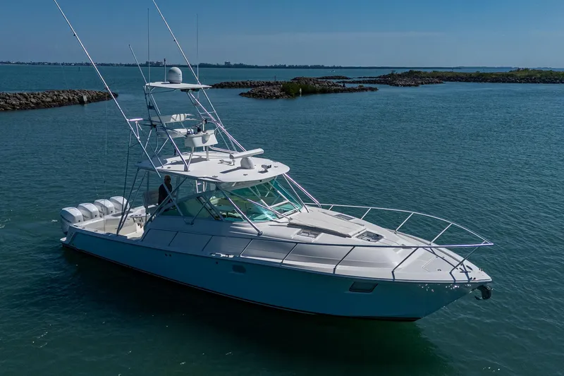 Refit 2018 - Reel Deal Yacht Photos Pics 2012 SeaVee 43 Express yacht cruising on calm waters.