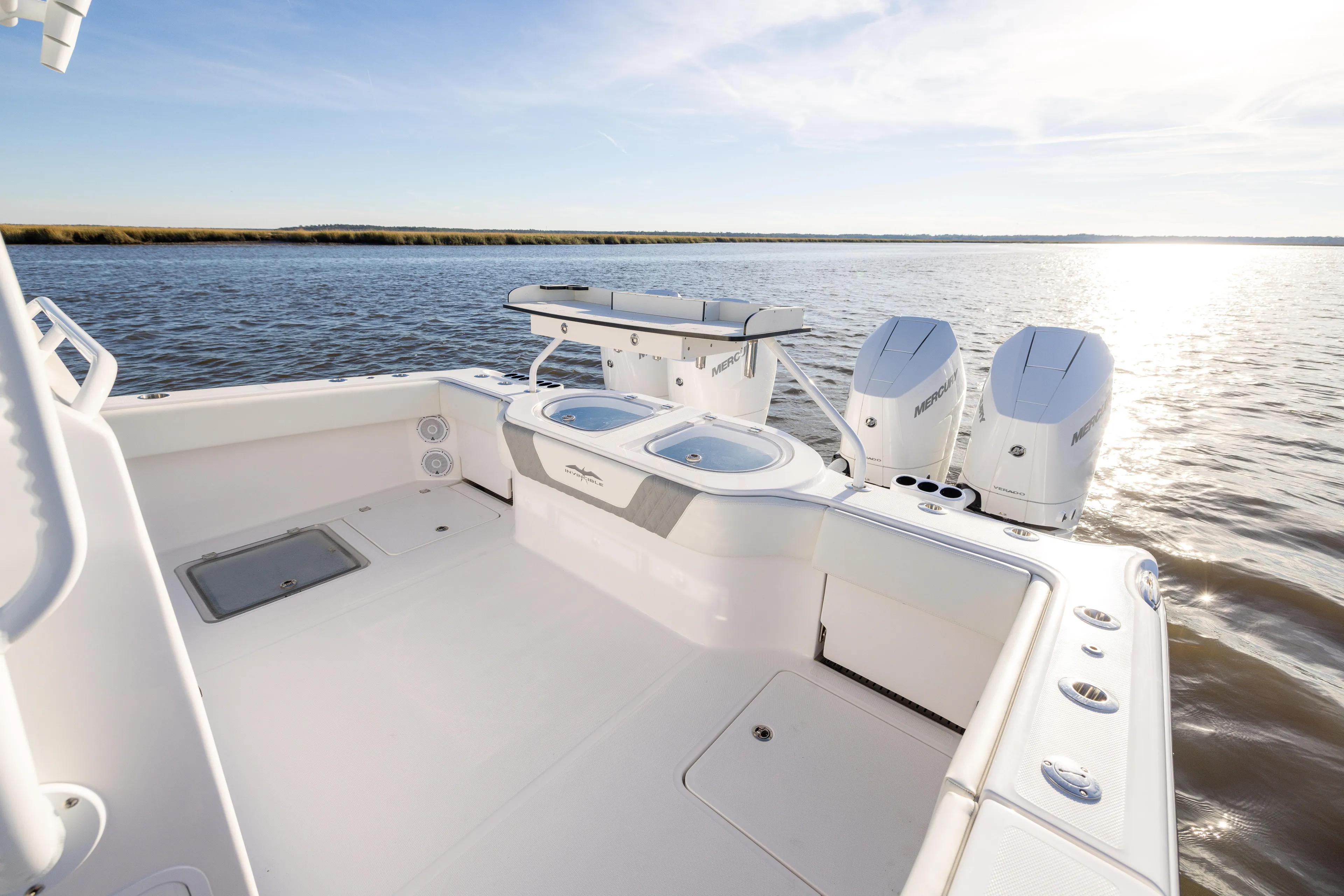  Yacht Photos Pics 2024 Invincible 40 Catamaran with dual engines on calm water, showcasing spacious deck.