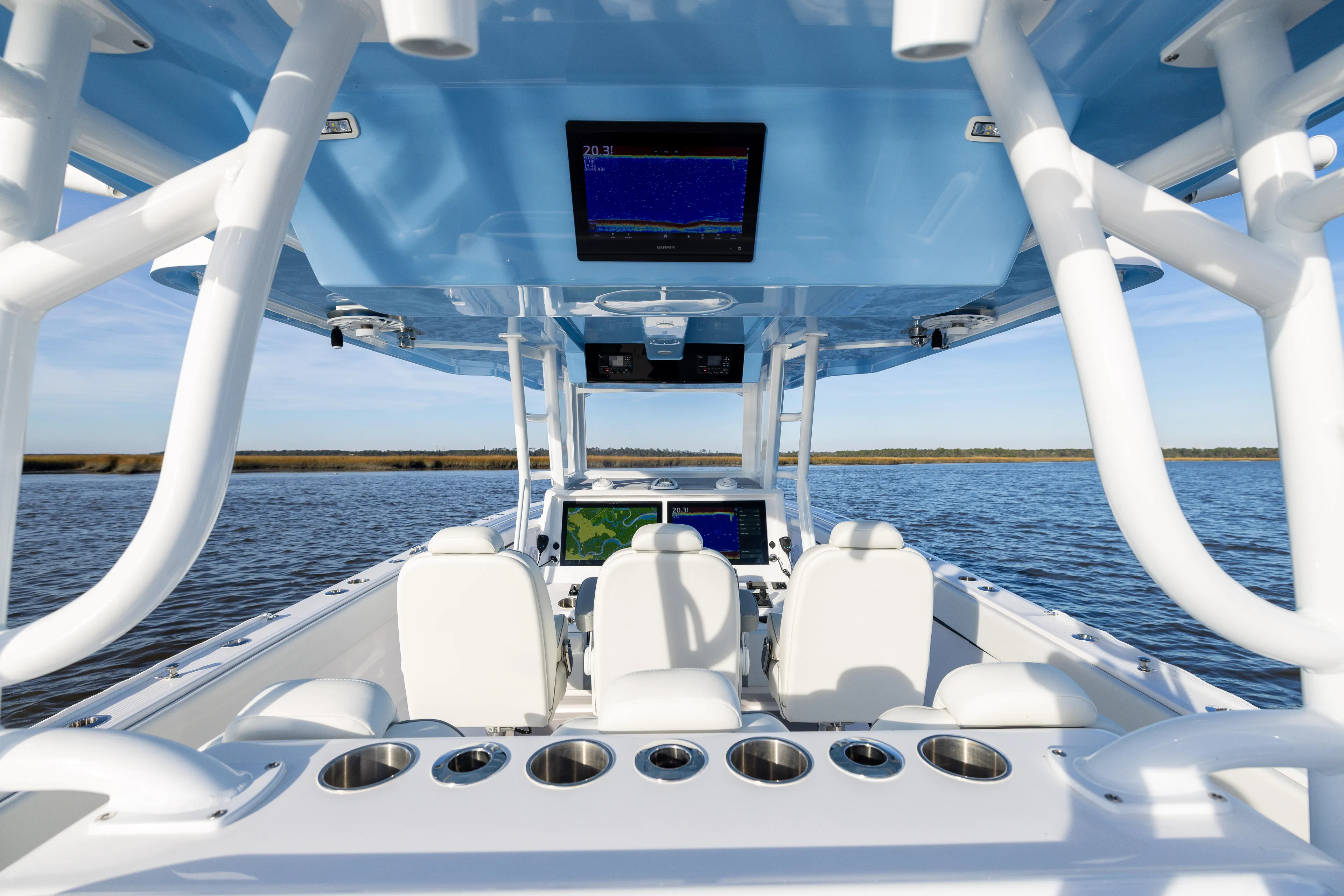  Yacht Photos Pics 2024 Invincible 40 Catamaran interior with advanced navigation systems on open water.