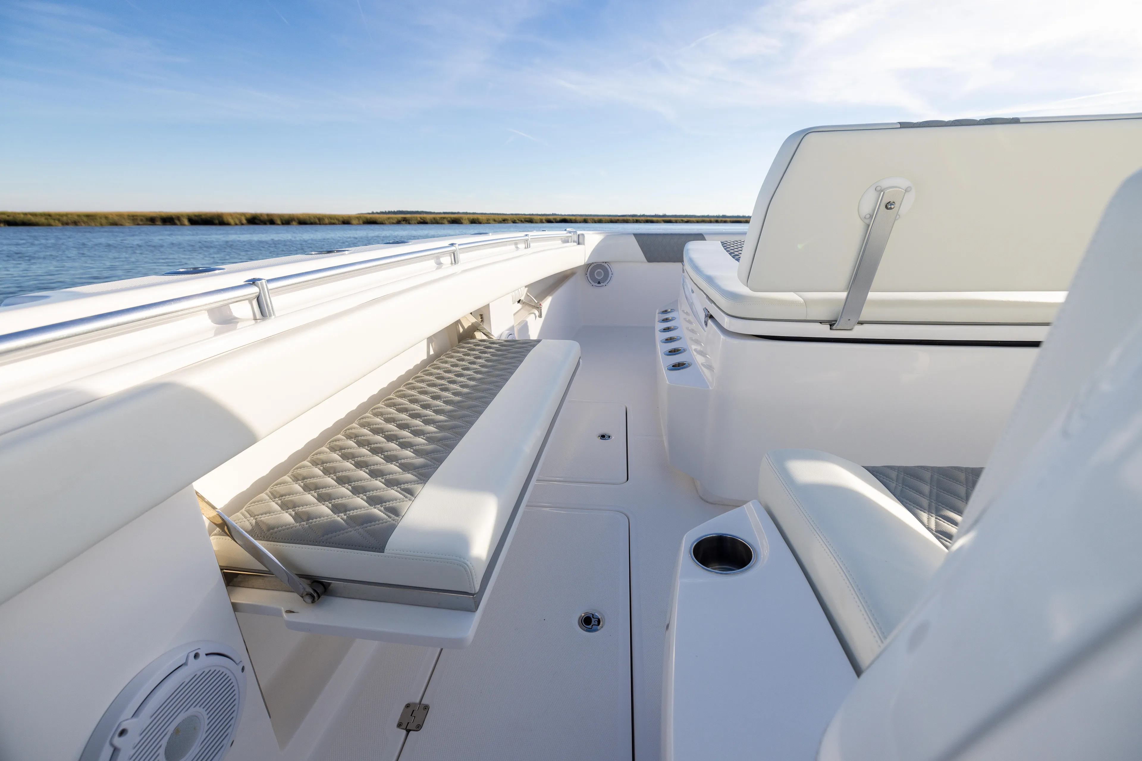  Yacht Photos Pics 2024 Invincible 40 Catamaran interior with luxurious seating and sleek design on open water.