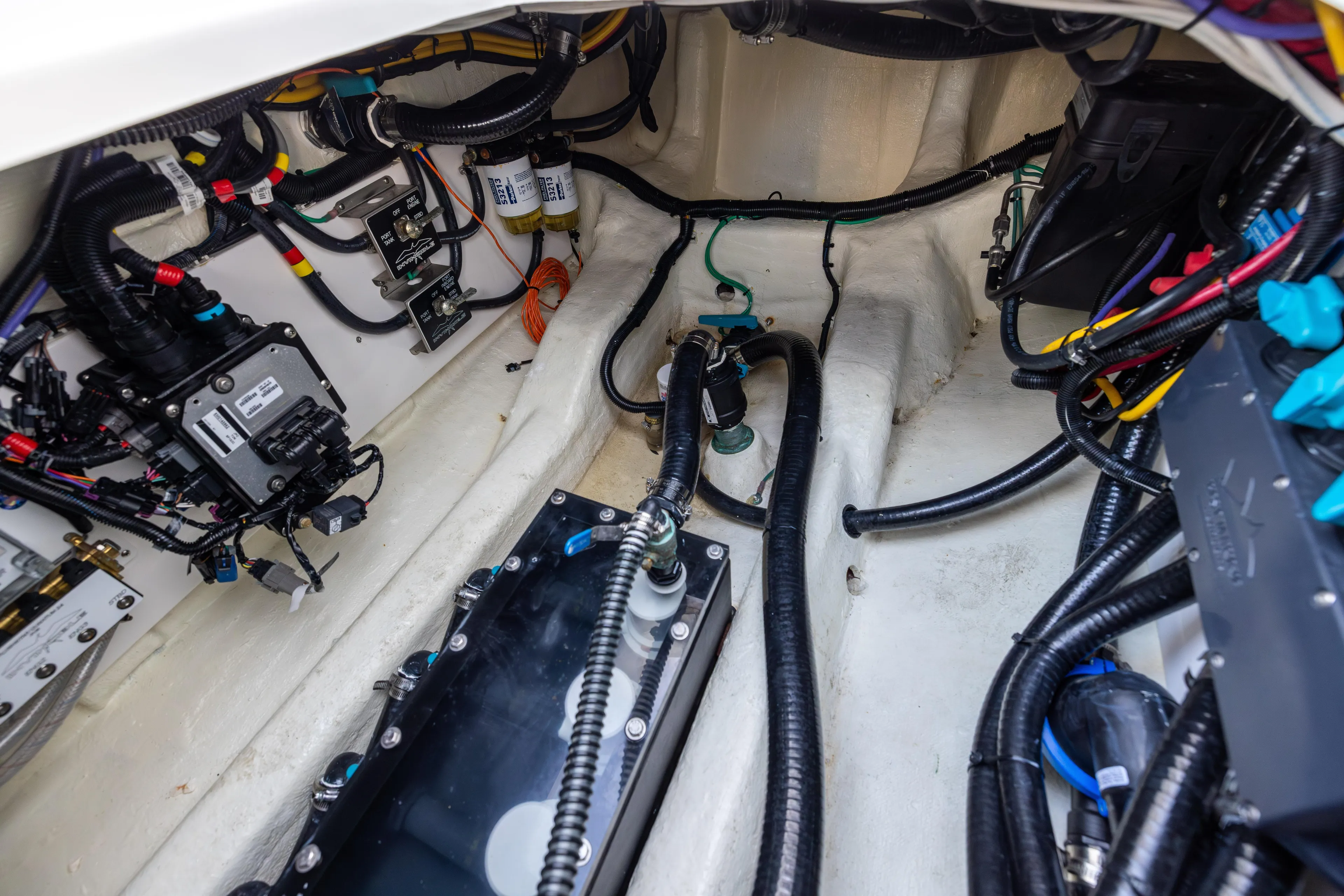  Yacht Photos Pics Engine compartment of 2024 Invincible 40 Catamaran, showcasing wiring and components.