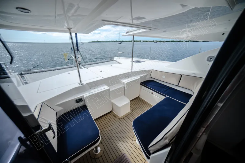 Purple Pearl Yacht Photos Pics Luxurious 2015 Leopard 48 yacht interior with elegant seating and ocean view.