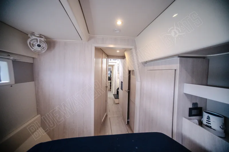 Purple Pearl Yacht Photos Pics Interior of 2015 Leopard 48 yacht, featuring modern design and spacious hallway.