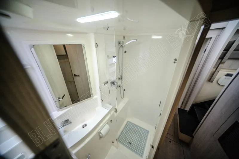 Purple Pearl Yacht Photos Pics Luxurious bathroom in 2015 Leopard 48 yacht with modern fixtures and spacious shower.