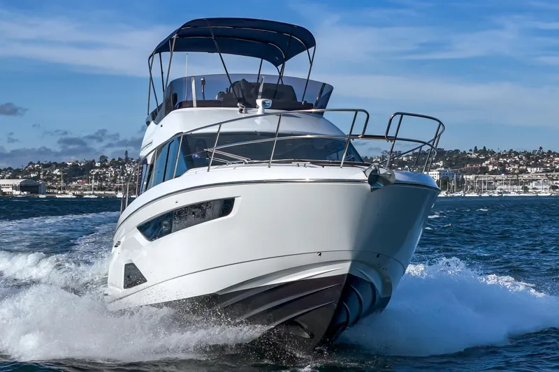  Yacht Photos Pics 2024 Bavaria R40 yacht cruising on open water, showcasing sleek design and powerful performance.