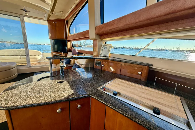 Cynisca Yacht Photos Pics Luxurious interior of 2006 Meridian 391 Sedan yacht with ocean view and modern amenities.