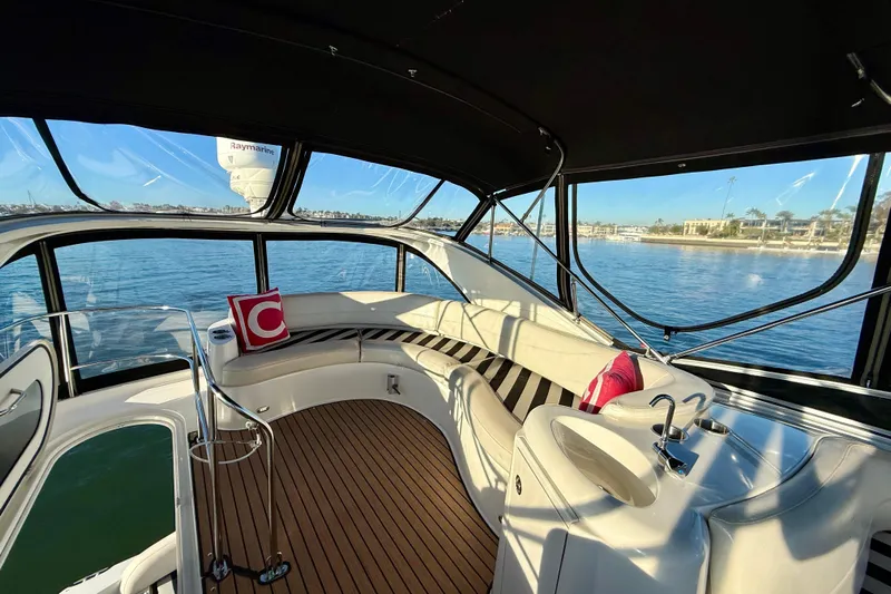 Cynisca Yacht Photos Pics Luxurious interior of 2006 Meridian 391 Sedan yacht with scenic water view.