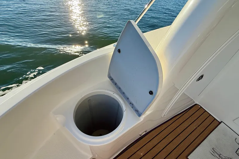 Cynisca Yacht Photos Pics Open hatch on 2006 Meridian 391 Sedan yacht, overlooking calm water.
