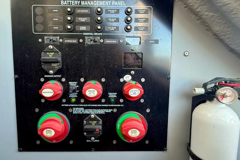 Cynisca Yacht Photos Pics Battery management panel on 2006 Meridian 391 Sedan yacht with fire extinguisher.