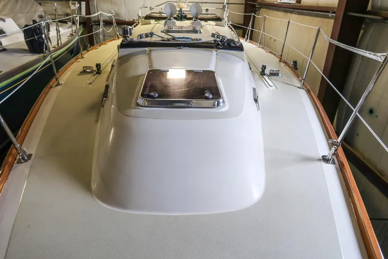 September Song Yacht Photos Pics 2007 Sabre 386 sailboat deck view, showcasing sleek design and rigging details.