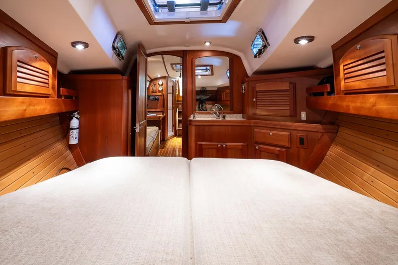 September Song Yacht Photos Pics Luxurious 2007 Sabre 386 yacht interior with wood finish and cozy cabin space.