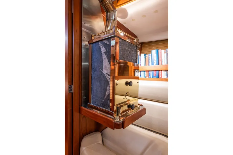 September Song Yacht Photos Pics Luxurious interior of 2007 Sabre 386 yacht featuring elegant wood and metal accents.
