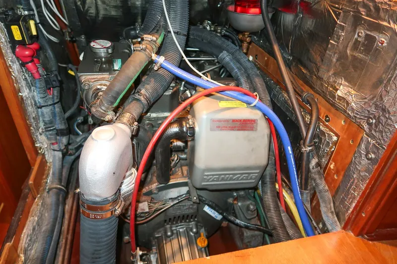 September Song Yacht Photos Pics Engine compartment of a 2007 Sabre 386 sailboat with Yanmar components and wiring.