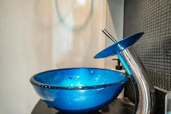 My Reality Yacht Photos Pics Blue glass sink with modern faucet on Neptunus 62 Flybridge yacht, 2012 model.