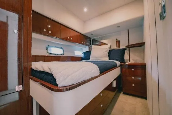 My Reality Yacht Photos Pics Luxurious cabin interior of 2012 Neptunus 62 Flybridge yacht with cozy bedding.