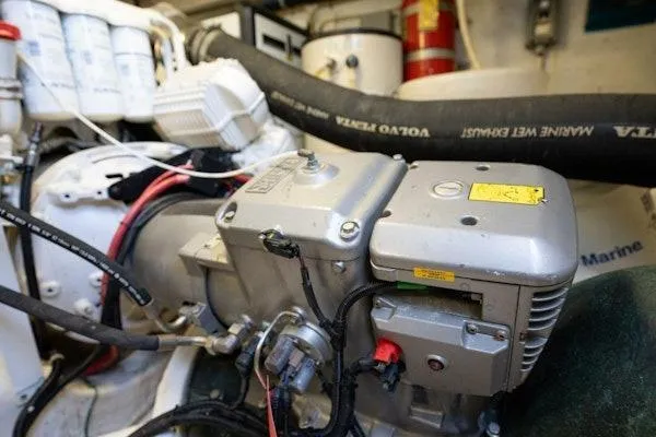 My Reality Yacht Photos Pics Engine room of 2012 Neptunus 62 Flybridge yacht, showcasing mechanical components and wiring.