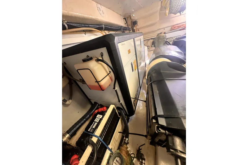 My Reality Yacht Photos Pics Engine room of 2012 Neptunus 62 Flybridge yacht, showcasing machinery and components.