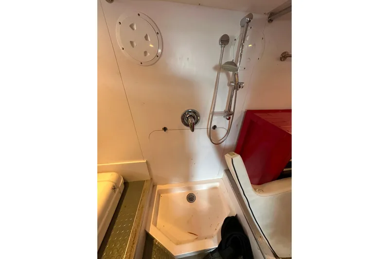 My Reality Yacht Photos Pics Shower area in 2012 Neptunus 62 Flybridge yacht, featuring modern fixtures.