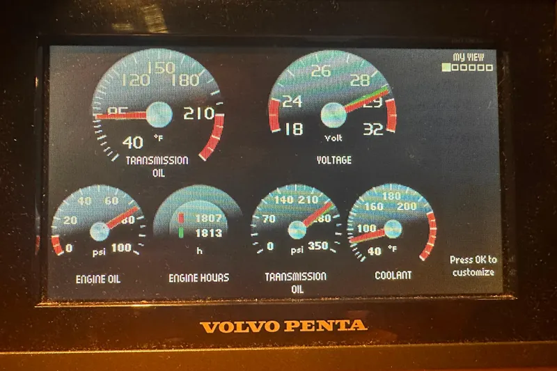 My Reality Yacht Photos Pics Dashboard display of a 2012 Neptunus 62 Flybridge with engine metrics and Volvo Penta branding.