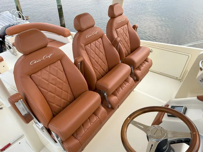 Ufo Yacht Photos Pics Luxurious leather seating in 2018 Chris-Craft Launch 38 boat, featuring elegant design and craftsmanship.