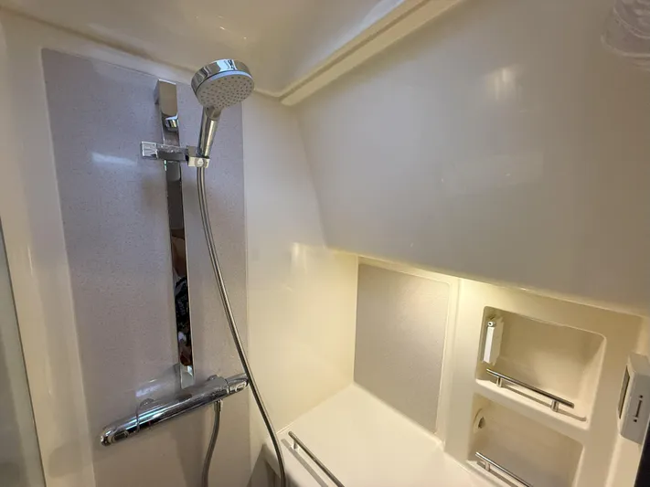 Ufo Yacht Photos Pics 2018 Chris-Craft Launch 38 bathroom with modern shower and sleek design.