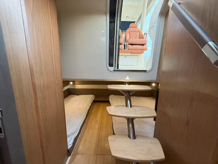 Ufo Yacht Photos Pics 2018 Chris-Craft Launch 38 cabin interior with wooden steps and twin beds.