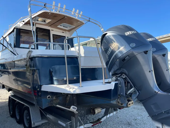  Yacht Photos Pics 2019 Cutwater C-302 Coupe boat with dual Yamaha engines on a trailer.