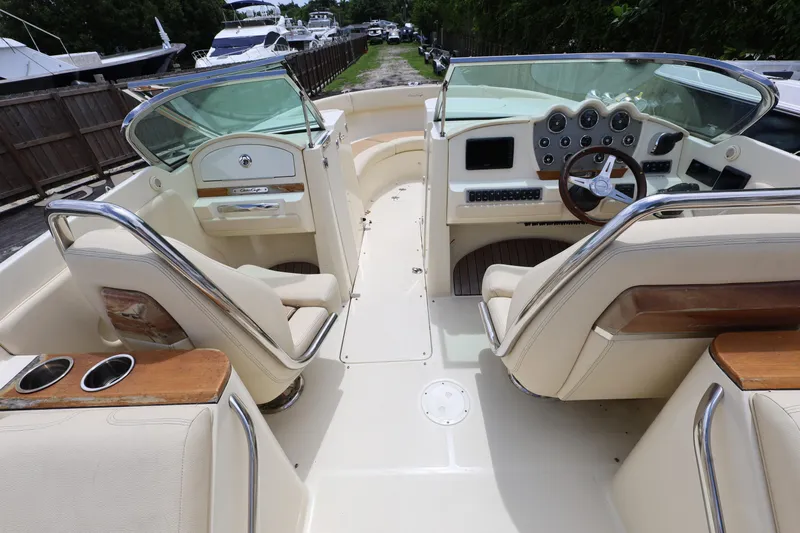  Yacht Photos Pics 2020 Chris-Craft 30 Launch boat interior with luxurious seating and modern dashboard.