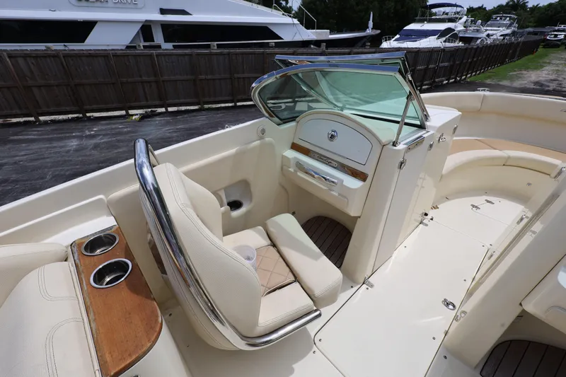  Yacht Photos Pics 2020 Chris-Craft 30 Launch boat interior with luxurious seating and elegant design.