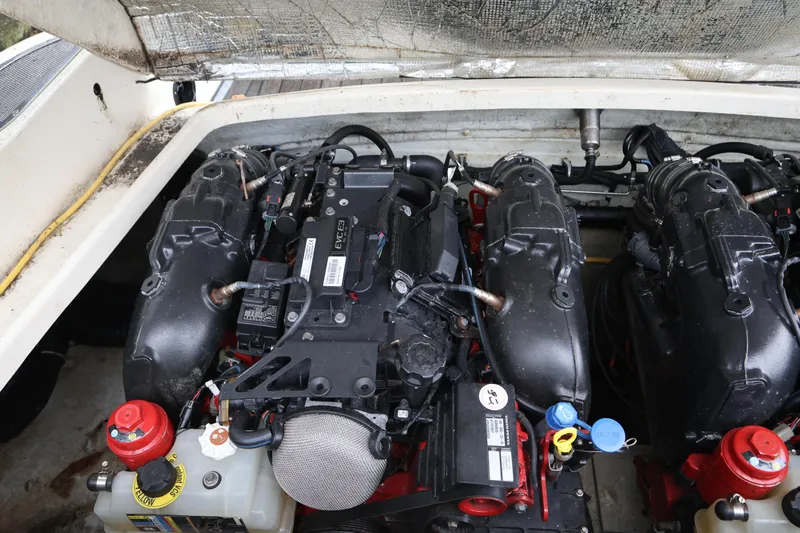  Yacht Photos Pics 2020 Chris-Craft 30 Launch engine compartment with dual engines and components visible.